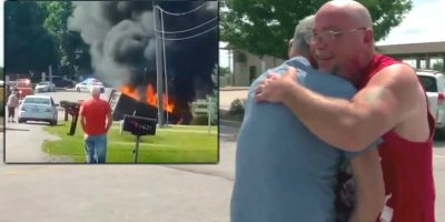 A man saves a stranger who was trapped in a crashed truck caught on fire. A man saves a stranger who was trapped in a crashed truck caught on fire.