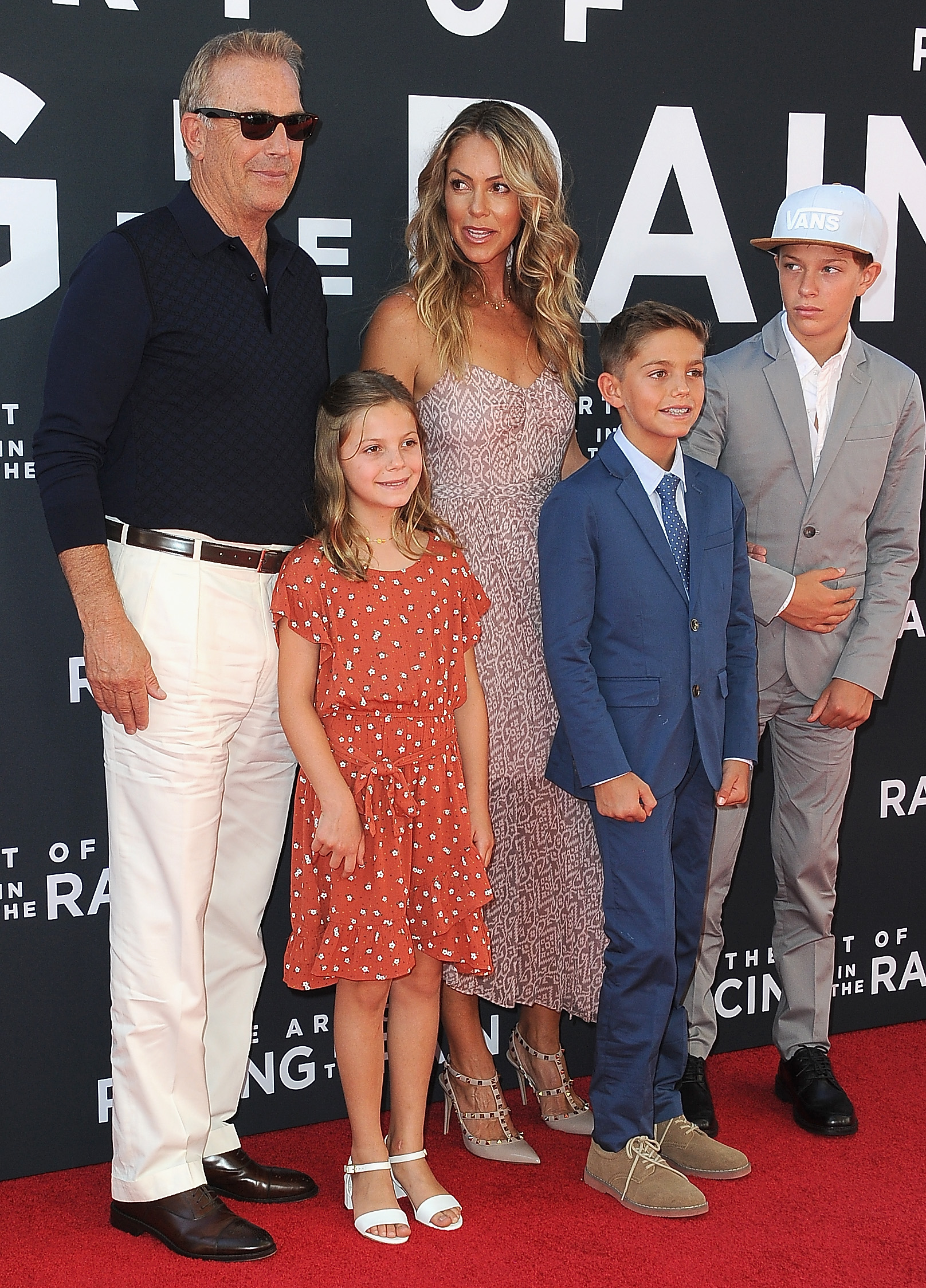 Grace Avery, Kevin, and Hayes Logan Costner, Christine Baumgartner, and Cayden Wyatt Costner at the premiere of "The Art of Racing In The Rain" on August 1, 2019, in Los Angeles, California | Source: Getty Images