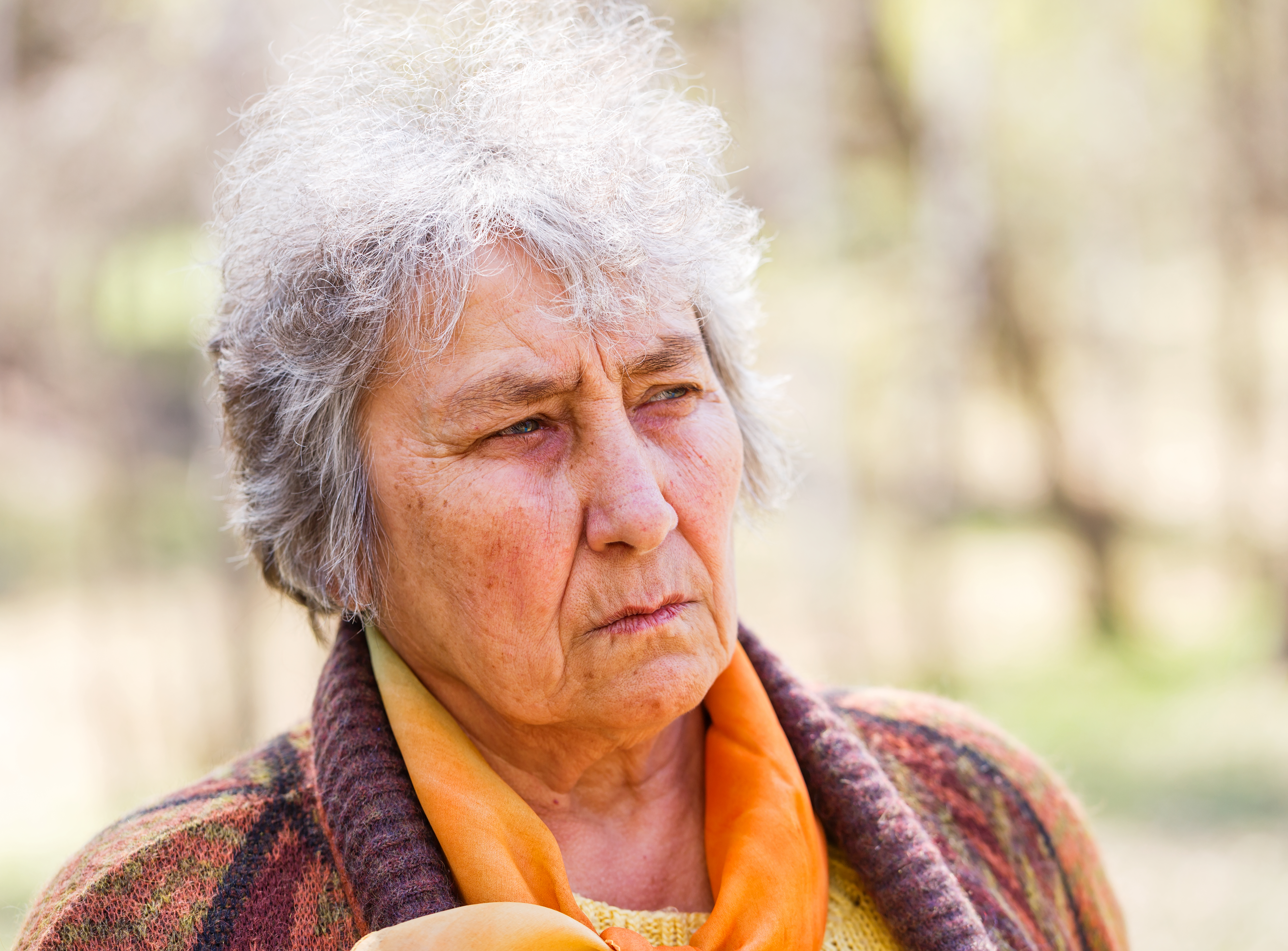 An angry-looking older woman | Source: Shutterstock