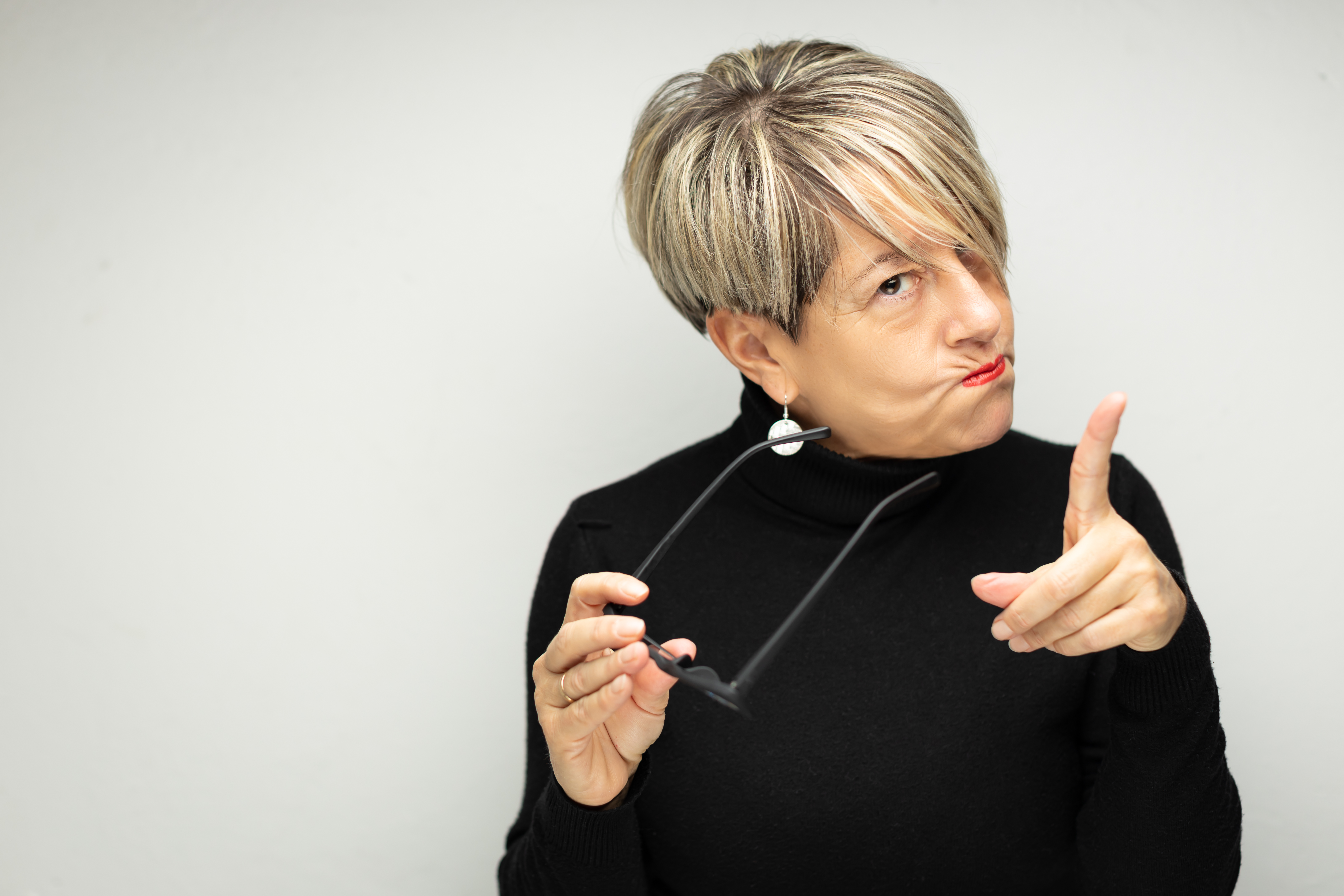 Mature woman scolding someone | Source: Getty Images