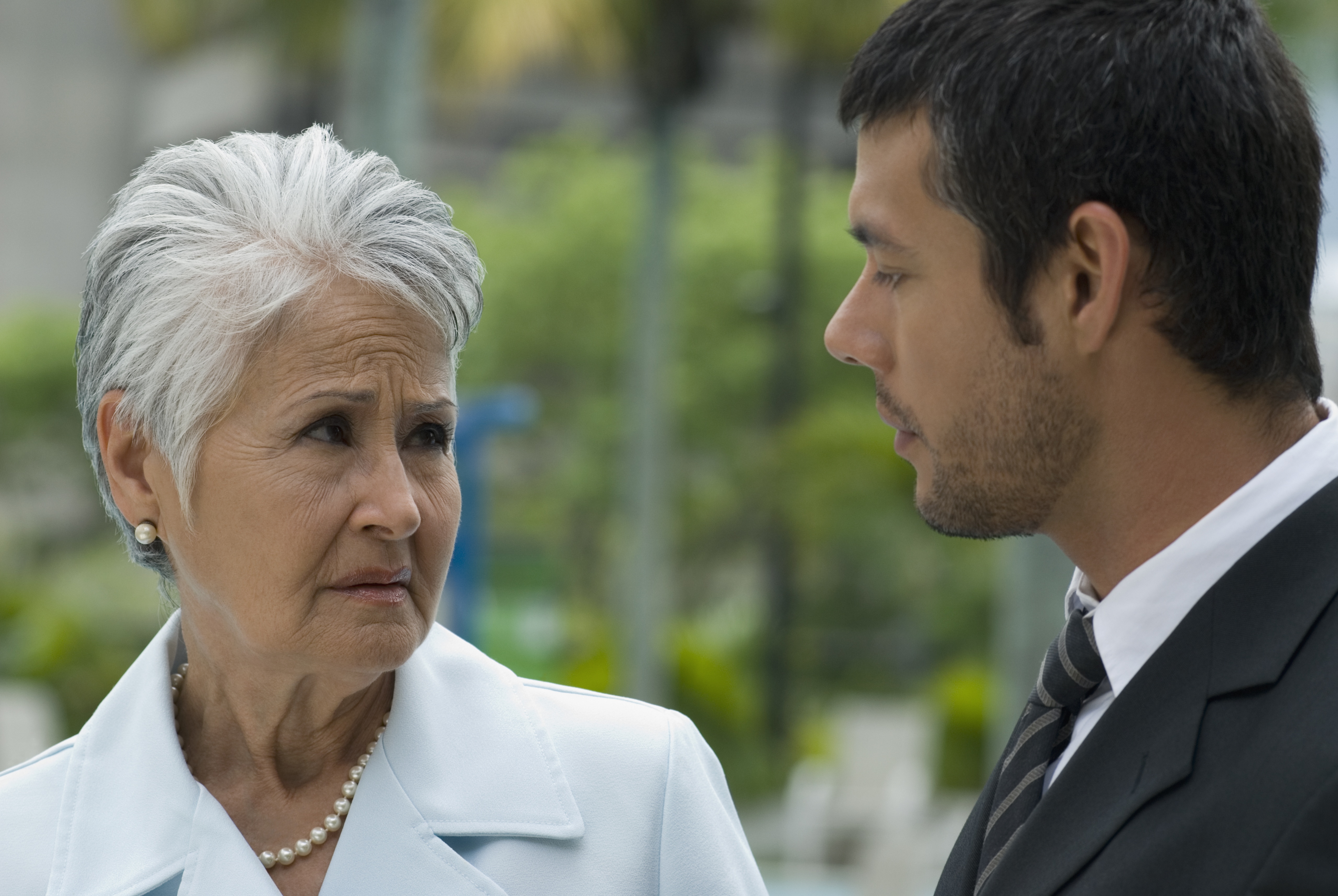 A man and his mother talking seriously | Source: Getty Images