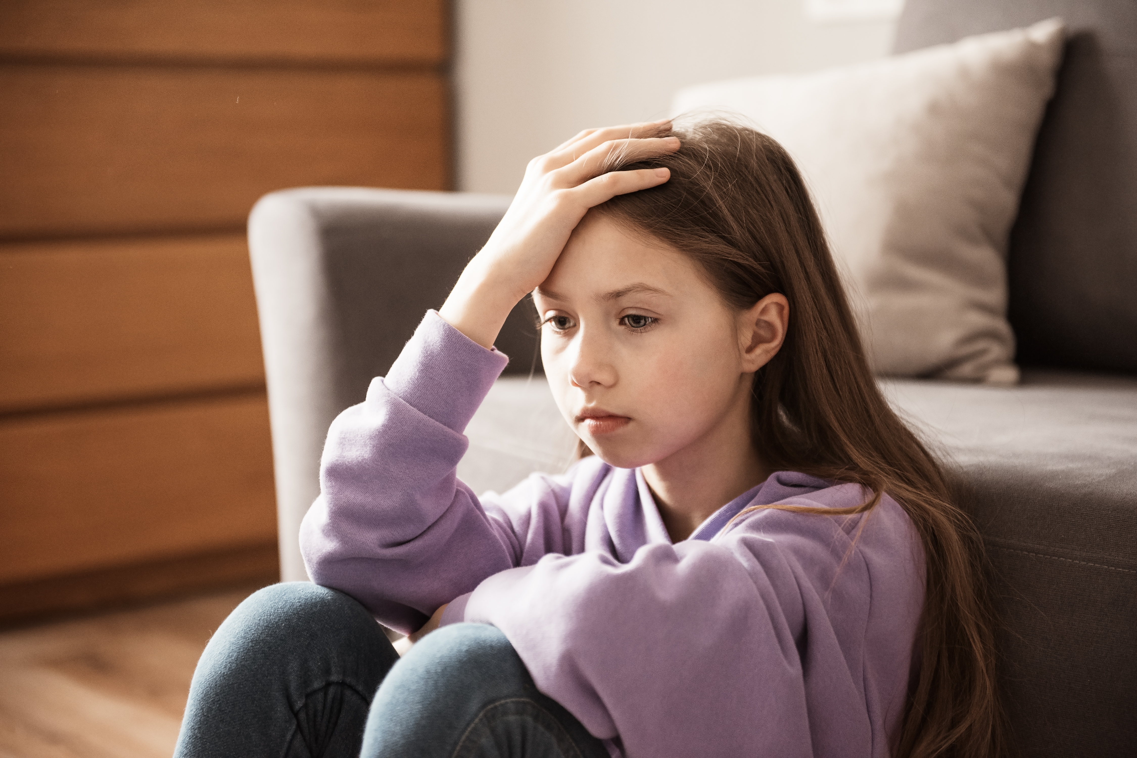 A sad teenage girl | Source: Shutterstock