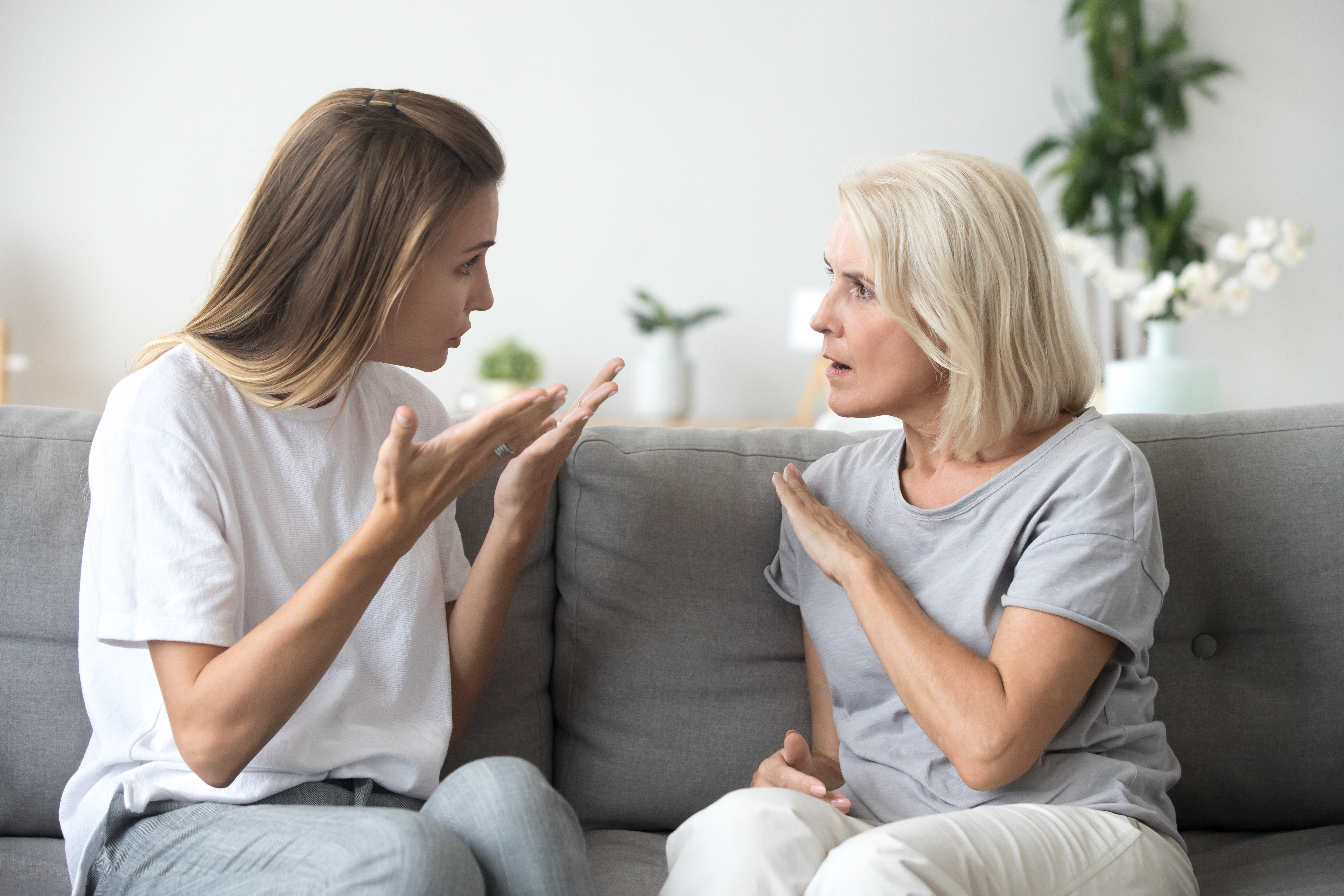 A young woman arguing with her mother | Source: Shutterstock