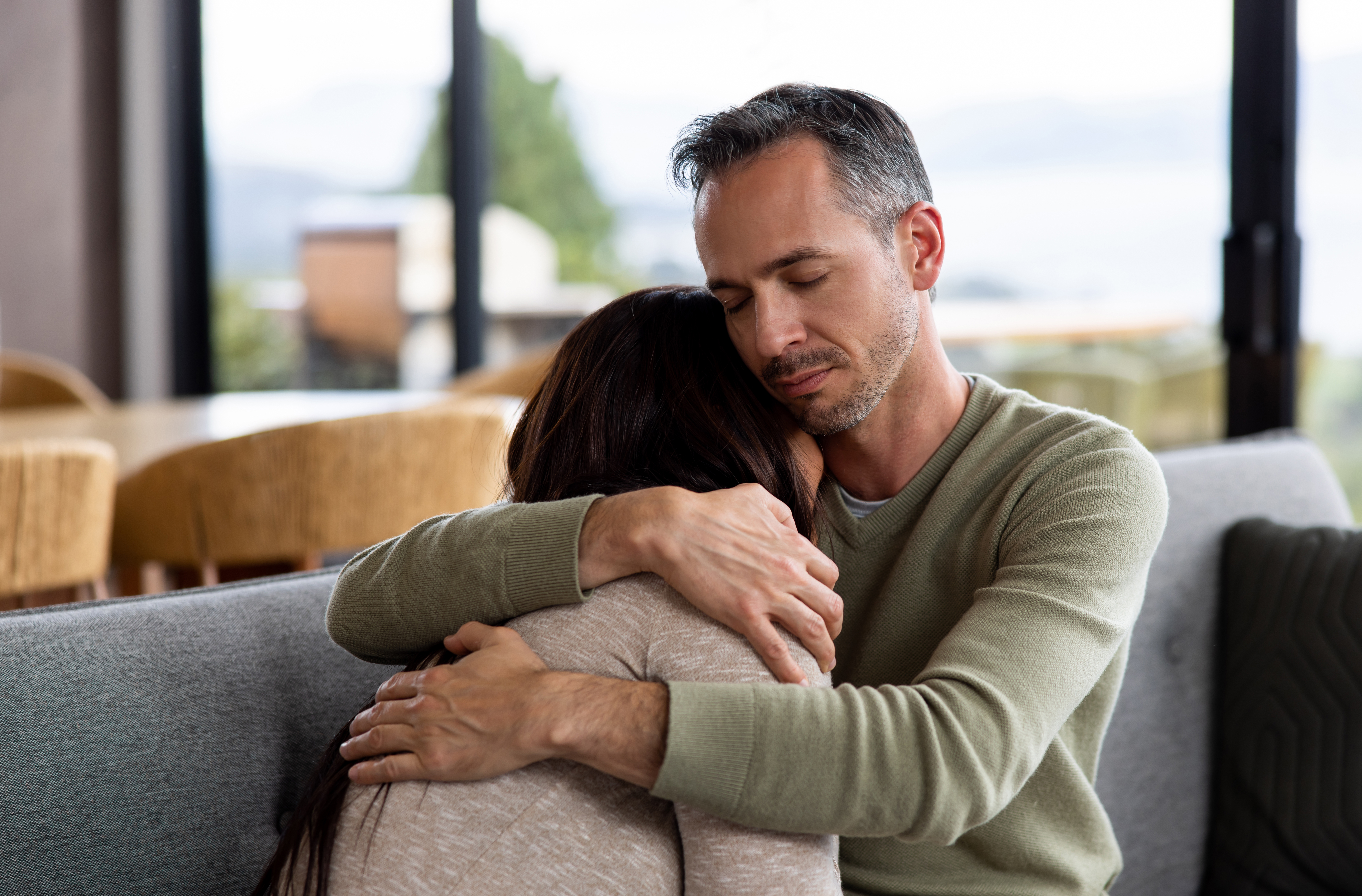 A husband assuring his wife | Source: Getty Images