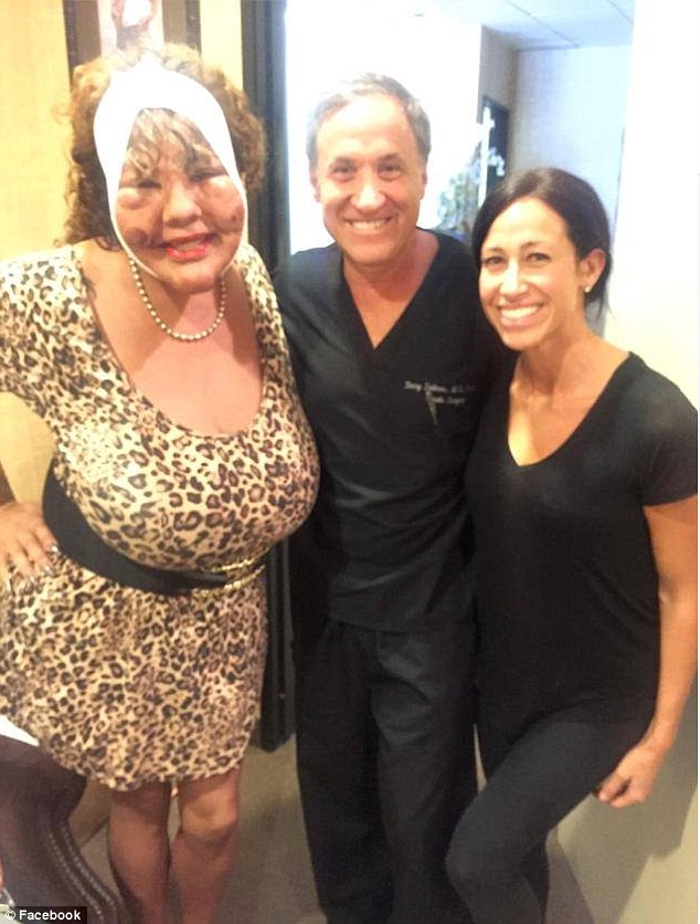 Looking happy: Rajee was all smiles when she struck a pose with Dr. Dubrow in his Los Angles office after one of her procedures 